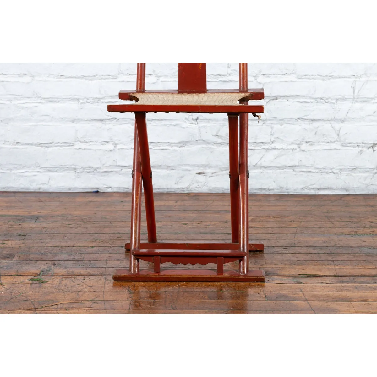 Chinese Early 20th Century Red Lacquer Traveller's Folding Chair with Woven Seat